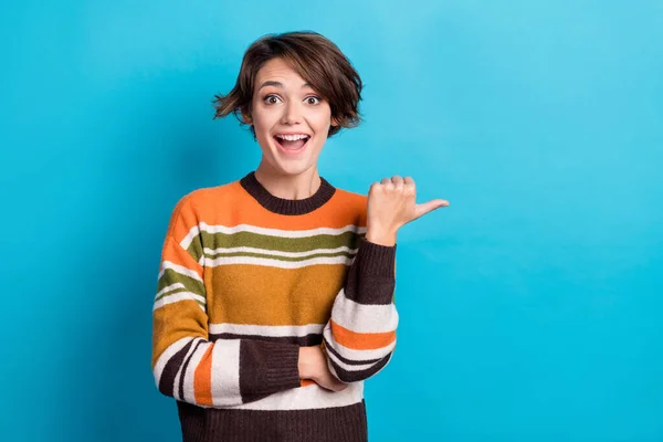 Photo Excited Funky Woman Dressed Striped Pullover Pointing Thumb Empty — Stock Photo, Image