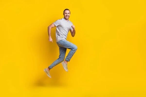 Full Length Photo Excited Funky Guy Dressed Grey Shirt Jumping — Zdjęcie stockowe