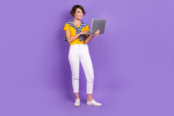 stock image Full length photo of pretty glad lady jumper shoulders read instagram telegram twitter post empty space isolated on purple color background.