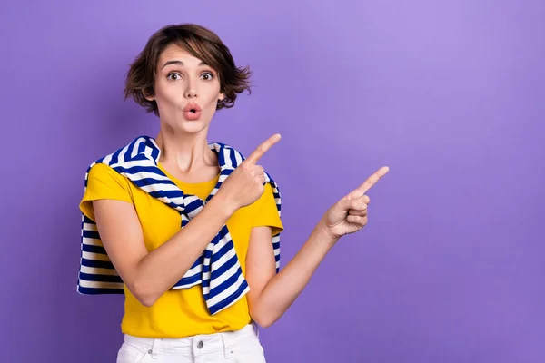 Photo of impressed funky lady dressed tied jumper showing two fingers empty space isolated violet color background.