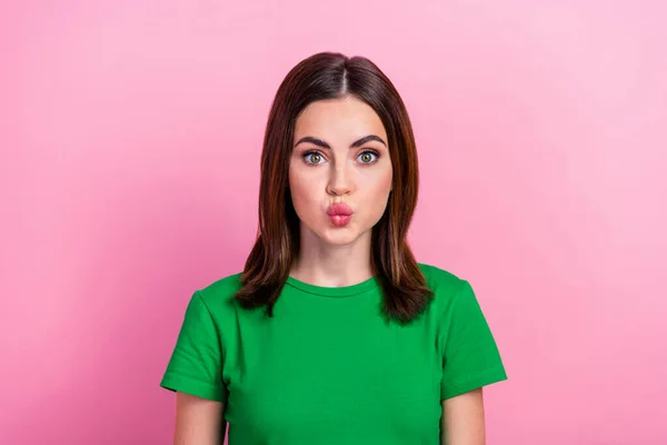 stock image Photo of sweet shiny lady dressed green t-shirt sending you kiss lips pouted isolated pink color background.