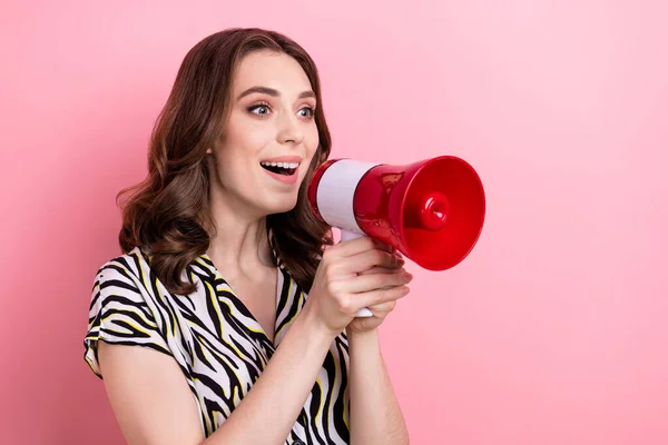 Profile photo of charming cheerful person hands hold loudspeaker talk empty space isolated on pink color background.