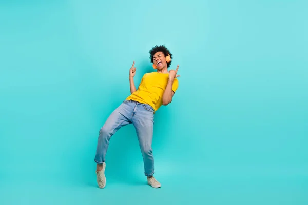 Stock image Full length photo of crazy positive person point fingers listen favorite song isolated on aquamarine color background.