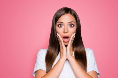 NO WAY Close up portrait of frustrated girl with wide open eyes mouth holding palms near cheeks looking at camera isolated on gray background. clipart