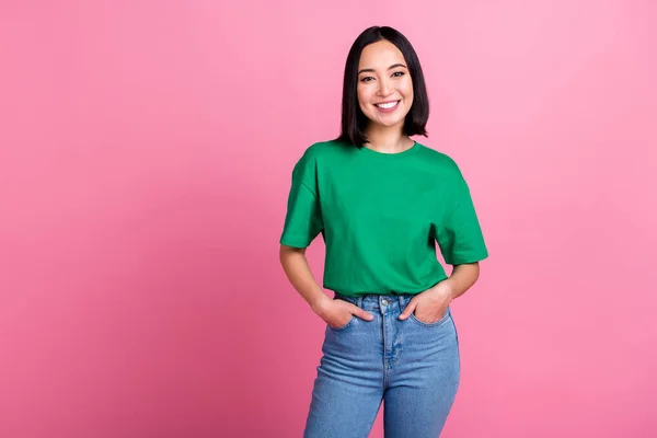 Stock image Portrait of cute positive person put hands pockets beaming smile empty space isolated on pink color background.