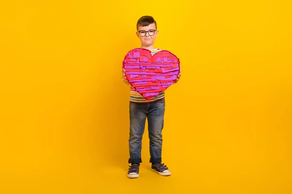 Full size photo of adorable kid boy holding handmade surprise for mother day event celebration isolated shine color background.