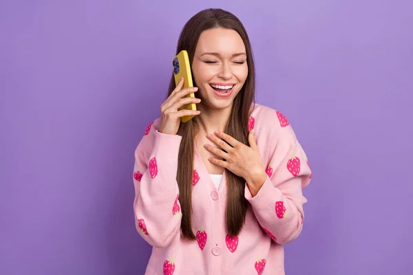 Photo of funky pretty lady dressed strawberry print cardigan talking modern gadget laughing isolated purple color background.