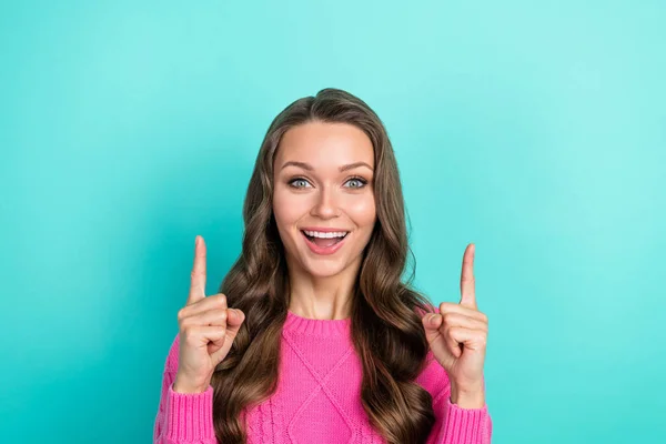stock image Portrait of positive lovely lady wear trendy clothes demonstrate empty space recommend quality product isolated on cyan color background.
