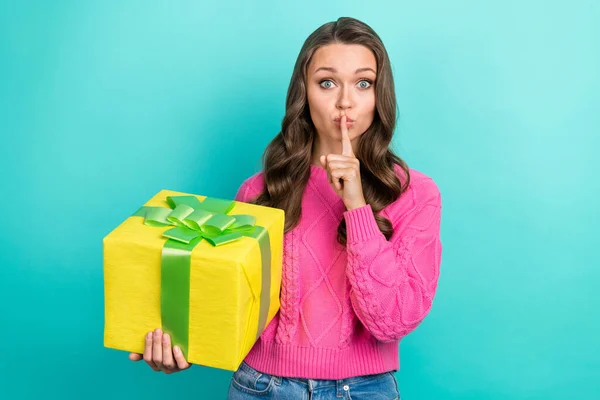 Portrait of pretty lovely lady wear stylish pink clothes hand close mouth hold giftbox preparing surprise isolated on cyan color background.