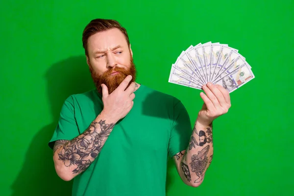 Photo Attractive Unsure Guy Dressed Shirt Looking Money Fan Arm — Stock Photo, Image