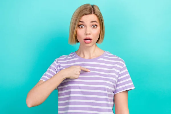 Photo of young confused girl wear striped t-shirt direct finger herself unexpected she guilty speechless isolated on cyan color background.