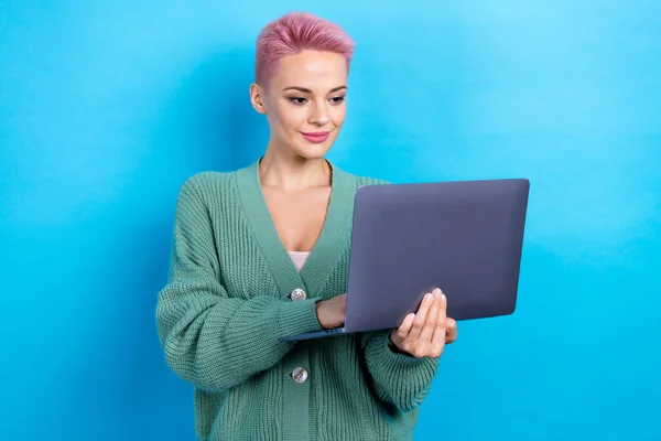 Photo of professional it courses teacher woman wear trendy shirt hold netbook browsing instagram direct isolated on blue color background.