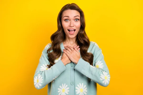 Photo of impressed funky lady dressed teal cardigan arms chest open mouth isolated yellow color background.