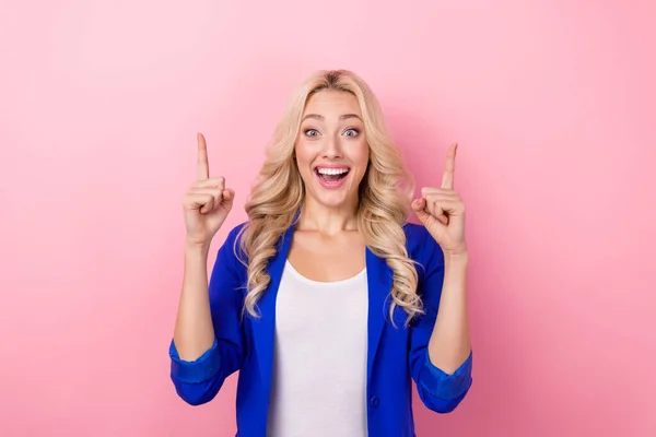 stock image Photo of attractive business woman blonde curly hair direct fingers up empty space breaking news about company isolated on pink color background.