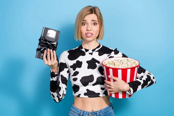 Portrait Attractive Disappointed Girl Hold Big Popcorn Box Ruined Videocassette — Stock Photo, Image