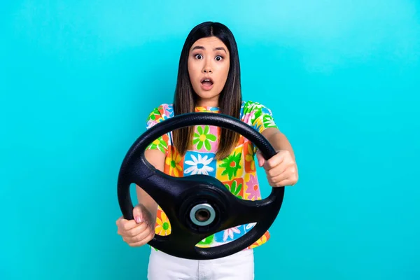 stock image Photo of impressed reaction young woman rent car accidentally crashed automobile confused isolated on aquamarine color background.