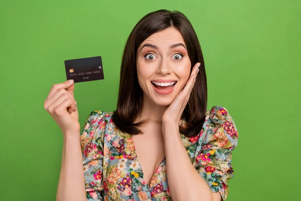 Photo Impressed Cheerful Person Arm Touch Cheek Hold Showing Debit — Stock Photo, Image