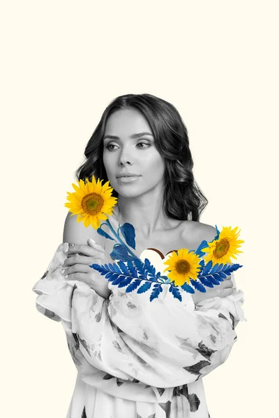 Vertical collage portrait of black white effect charming ukrainian girl arms embrace shoulders flourish sunflowers isolated on creative background.