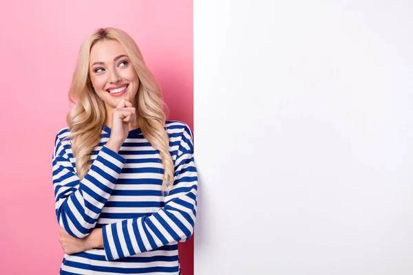 stock image Photo of sweet dreamy lady wear striped shirt arm chin looking placard empty space isolated pink color background.