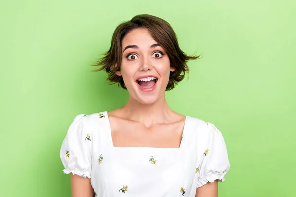 stock image Photo of excited impressed woman dressed white top smiling open mouth isolated green color background.