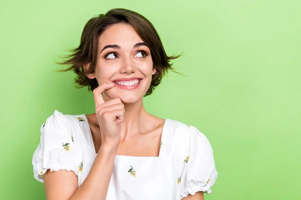 stock image Photo of attractive cute lady cunning look side have tricky plan childish face wear white shirt top isolated green color background.