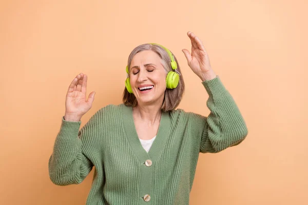 Photo Satisfied Careless Old Lady Wear Khaki Shirt Listen Energetic — Stock Photo, Image