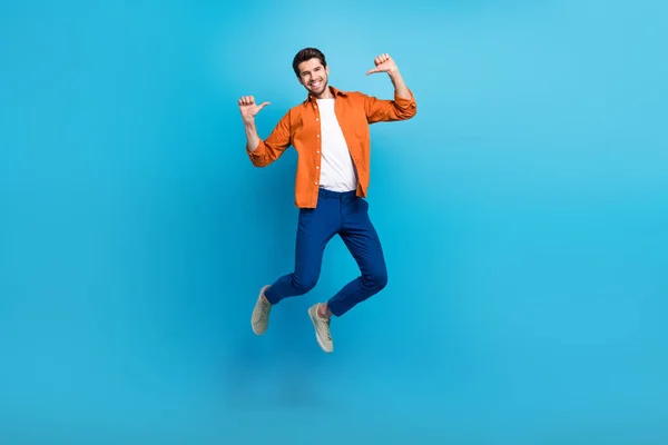 Full Length Portrait Crazy Carefree Active Man Jumping Point Fingers — Stock Photo, Image