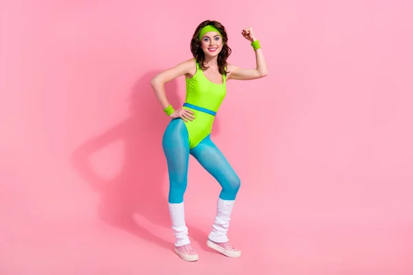 Photo of power coach sporty lady have sport routine show triceps muscular body isolated over pastel color background.