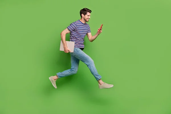 Full Length Photo Positive Cute Guy Wear Striped Shirt Jumping — Zdjęcie stockowe