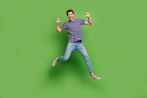 Full Length Photo Cool Excited Guy Wear Striped Shirt Jumping — Stock Photo, Image