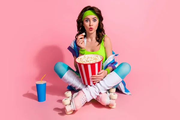 stock image Photo of shocked lady sporty trainer eat pop corn while watch football soccer match isolated pastel color background.