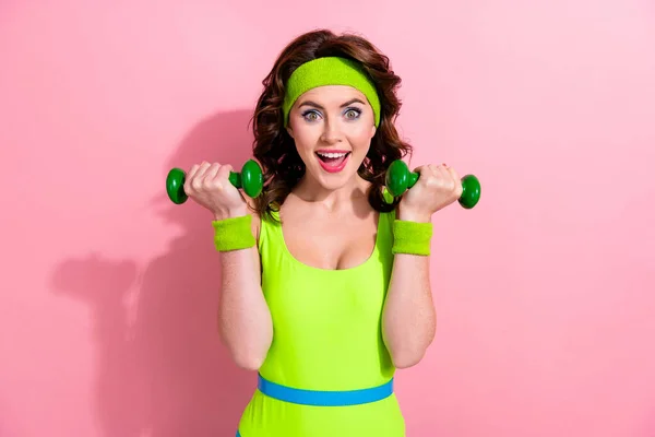 stock image Photo of excited lady sporty trainer raise barbells power lifting exercise in sport club isolated on pastel color background.