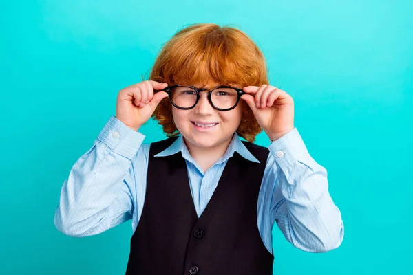 stock image Photo of cute intelligent positive schoolchild arms touch eyewear beaming smile isolated on teal color background.