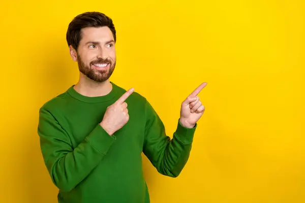 Photo Attractive Guy Promoter Direct Fingers Empty Space Look Read — Stock Photo, Image