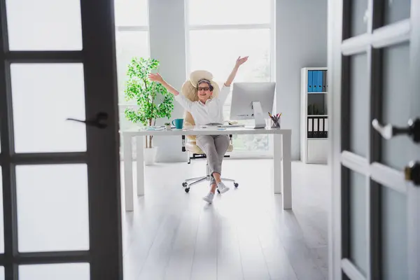 Full body size photo of funky raised hands up leader businesswoman mature aged celebrate project completed isolated home office indoors.