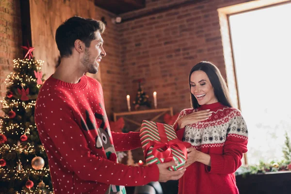 Photo portrait of two excited people married couple surprise boyfriend give his girlfriend xmas present she appreciate isolated indoors.