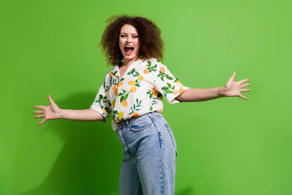 Photo of funky cheerful lady wear print shirt rising hands arms having disco fun isolated green color background.