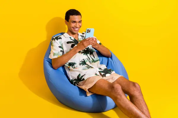 Photo Portrait Attractive Young Man Sit Blue Bean Bag Hold — Stock Photo, Image