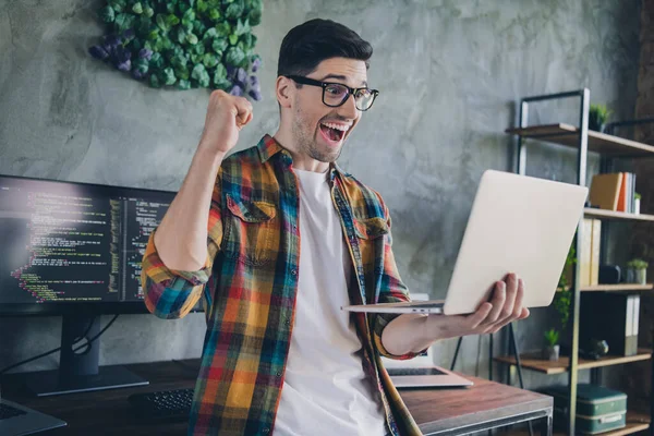 Photo Delighted Web Designer Use Wireless Laptop Raise Fist Shout — Stock Photo, Image