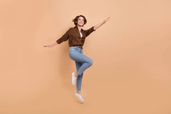Full Length Photo Positive Carefree Girl Dressed Brown Shirt Jumping — Stock Photo, Image