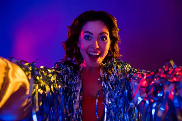 Photo of cool excited lady wear tinsel jacket recording video vlog disco party isolated neon purple color background.