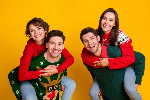 Photo of best friends company celebrate christmas x mas have fun piggyback isolated bright color background.