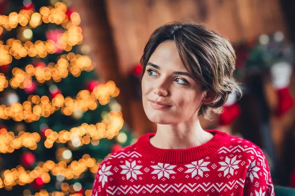 Portrait of nice young girl bob brown hair wear ugly red sweater dreaming looking minded garland magic xmas isolated on home background.