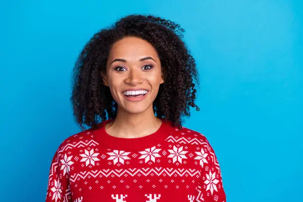 Stock image Portrait of young girlfriend surprised receiving gifts for happy new year holiday in winter season isolated on blue color background.