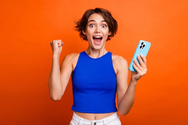 Photo Lucky Impressed Lady Wear Blue Singlet Rising Fist Online — Stock Photo, Image
