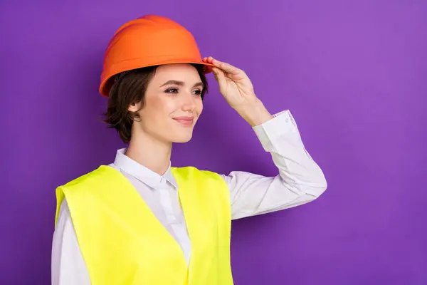 Profile photo of optimistic nice brunette hair lady wear builder uniform isolated on vivid purple color background.