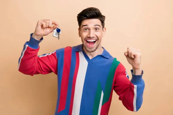 Portrait Delighted Cheerful Man Raise Fist Arm Hold New House — Stock Photo, Image