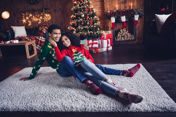 Photo of loving wife husband enjoy winter christmas time together in warm house indoors.