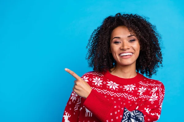 Photo cute lovely lady curly hairstyle raise fingers indicate empty space enjoying winter season discount isolated on blue color background.