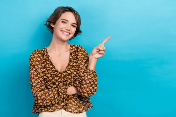 Photo portrait of charming lady wear old school retro blouse point finger empty space cheap stock market isolated on blue color background.